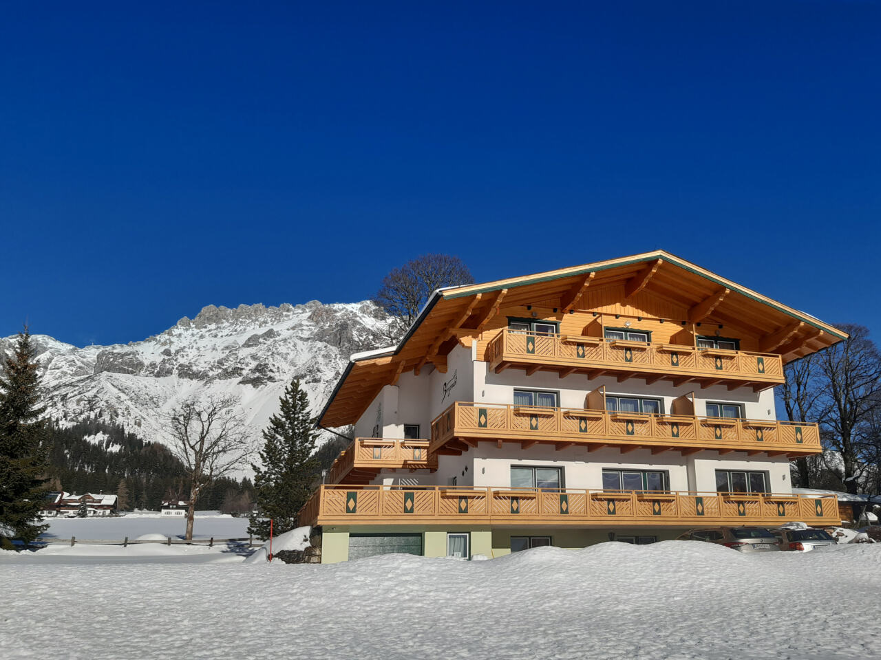 Pension Bergpracht in winter with a view of the Dachstein massif Pension Bergpracht in winter with a view of the Dachstein massif – winter holiday in Ramsau am Dachstein